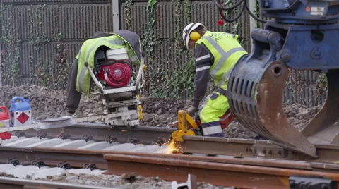 Railroad track working operating buzz saw with sparks Vidéo 52317881