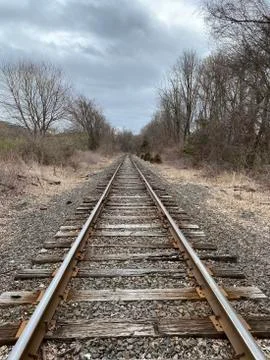 Railroad tracks on a cloudy day Stock Photos