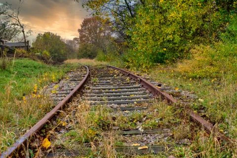 Railroad tracks with a dramatic sunset in the background. Picture from Scania Stock Photos