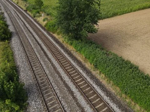 Railroad tracks in the landscape Stock Photos