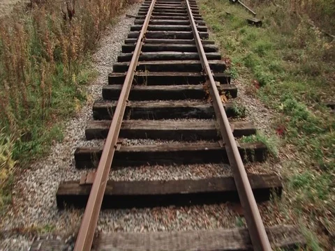 Railroad tracks low angle forward motion Stockbeeldmateriaal 71549782