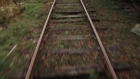 Railroad tracks low angle forward motion going through switch Stock Footage 71550409