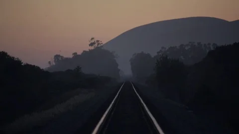 Railroad tracks at sunset Stock Footage 78771329