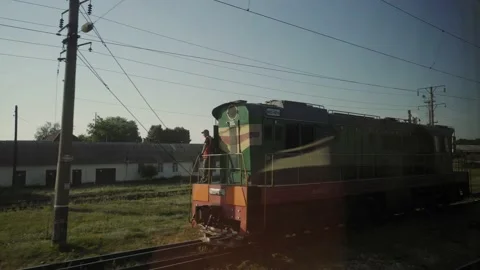 Railroad tracks view from the fast-moving train window. Railway wagons. Station. Stock Footage 152943465
