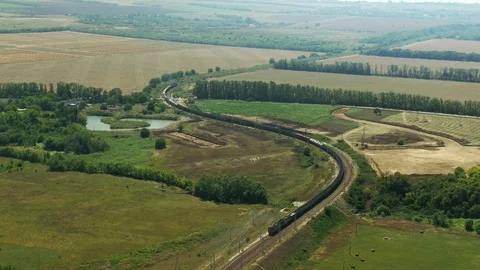 The railroad winds among fields Stock Footage 101577051