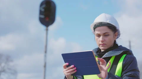 Railroad worker using tablet near signal beacon Stock Footage 152178301