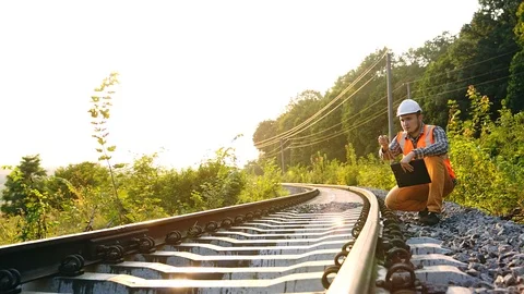 Railroad workers maintaining railways Stock Footage 98456682