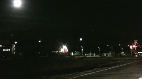 RailrunnerAtNightLeavingStation Stock Footage 286092