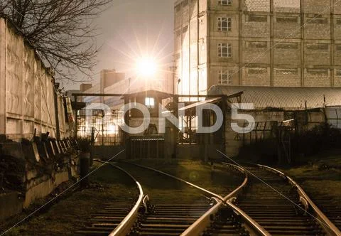 Rails and gates guarded the warehouse Stock Photos