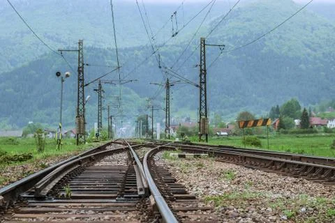 Rails going far on the background of beatiful mountains Stock Photos