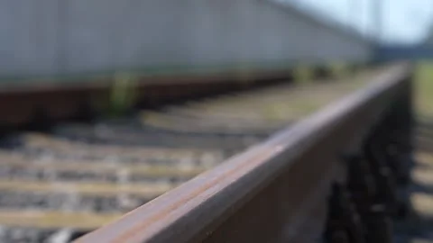 Rails, sleepers and mounting nuts close up Video stock 290064626
