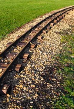 Railtracks through meadow Foto stock