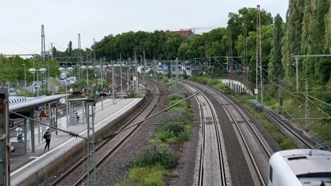 Railway and train pass platform Stock Footage 137921174