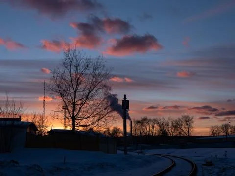 Railway on a background of a winter sunset Stock Photos