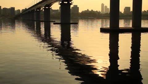Railway bridge and reflection on sunset Stock Footage 8928922