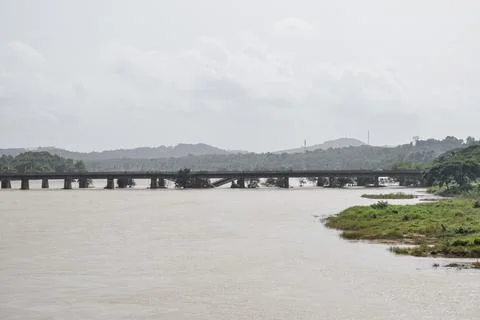 Railway bridge through a river Stock Photos
