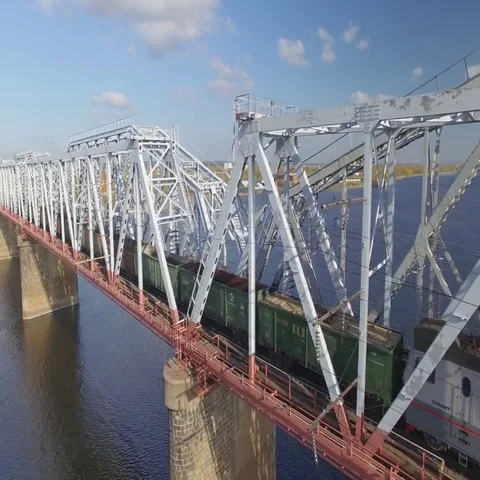 The railway bridge on which the train rides. Aerial view. 스톡 동영상 69630629