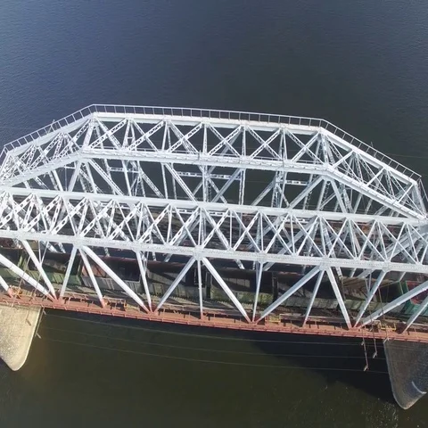 The railway bridge on which the train rides. Aerial view. Stock-Footage 69634109