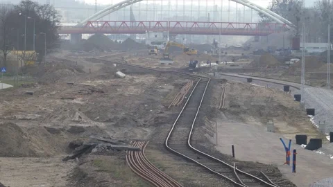 Railway Construction Site With Workers and Heavy Machinery Stock Footage 130990191