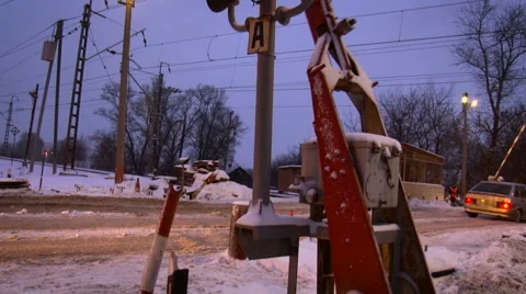 Railway Crossing Equipment. Gate Blocking the Earth Road on Both Sides. Red Stock Footage 68614386