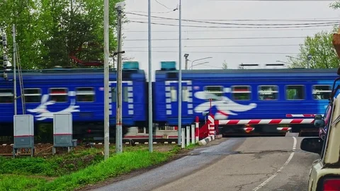 Railway crossing passing train Stock Footage 82991778