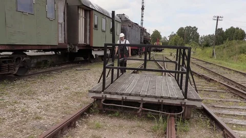 Railway employee check the depot territory Stock Footage