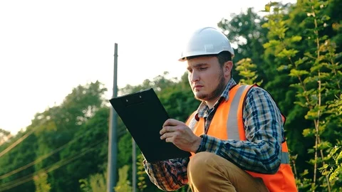 The railway engineer serves and checks the railroad for the safety of trains 動画素材 96015350