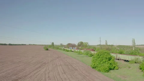 Railway in the field. parking of empty freight cars. Stock Footage 132060569