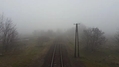 Railway in the fog Stock Footage 167023749