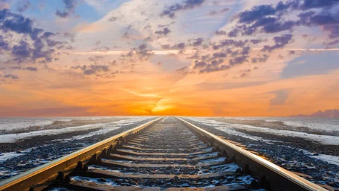 Railway leaving far at the sunset, winter transportation travel time lapse scene Stock Footage 237693892