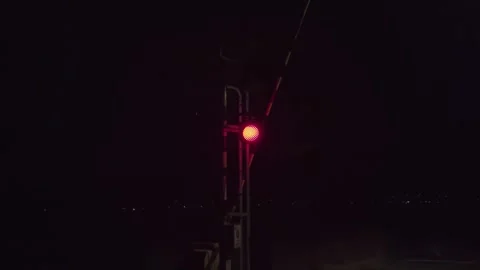 Railway level crossing at night Start of operation Alarm sound No train Stock Footage 297126170