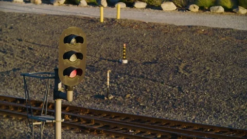 Railway light is set to stop / red in industrial area of Long Beach, California Stock Footage 114935800