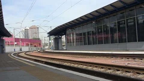 Railway lines and empty train platform at the railroad terminal Stock Footage 141341583