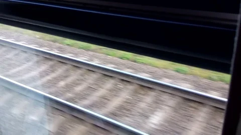 Railway from moving train window Видео 76264185
