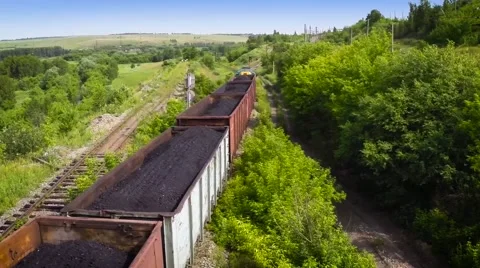 Railway - One Flew Over the freight train loaded with coal 50fps Stock Footage 51639550