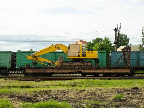 Railway. Railway repair site with..Excavator, special repair train with a tra Stock Photos
