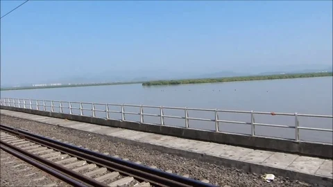 Railway Sea bridge view from fast moving Indian train window, Mumbai India Stock Footage 98917150