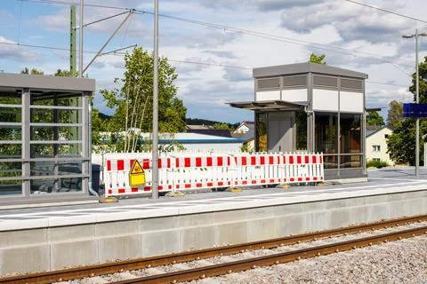 Railway Station Platform Under Construction with Safety Barriers and Elevator Stock Photos