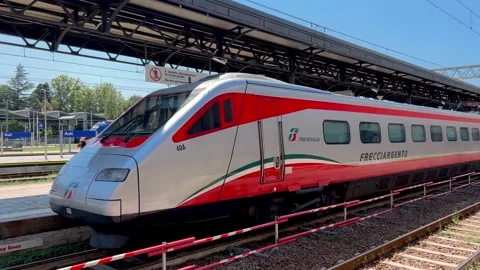 Railway station platform view with ETR 485 high-speed train frecciargento Stock Footage 282544027