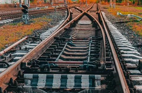 Railway switch close-up. Railway intersections. Two track directions. Stock Photos
