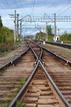 Railway switch in front of the station Stock Photos