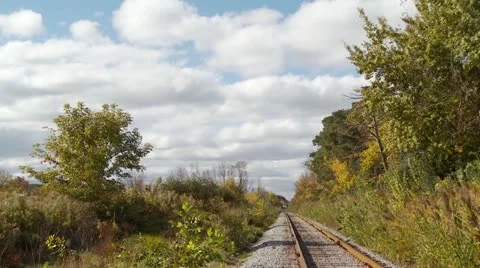 Railway track and clouds HD Stock Footage 12363461