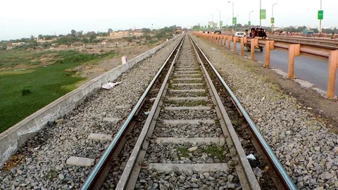 Railway Track besides road Video stock 74118758