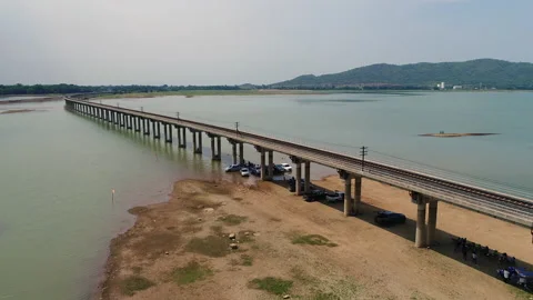 Railway Track Bridge on the Pasak Chonlasit dam Tourist attractions Stock Footage 132279171