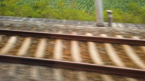 Railway track during a fast train ride Video stock 115444936