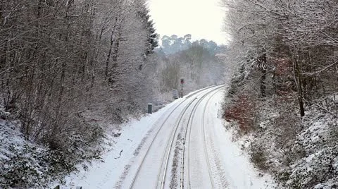 Railway track in snow signal changes 動画素材 20489702