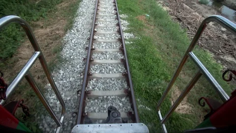 Railway track, train passing through in countryside. Stock Footage 120315660