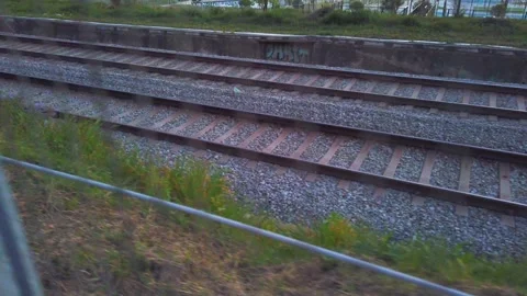 Railway Tracks at Dusk Viewed from Walking Path Vidéo 332241597