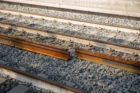 Railway tracks, empty tracks on a stretch of railway, a construction site and Stock Photos