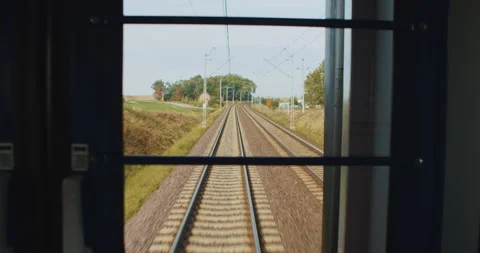 Railway tracks in motion, view from the train window Stock Footage 231705157
